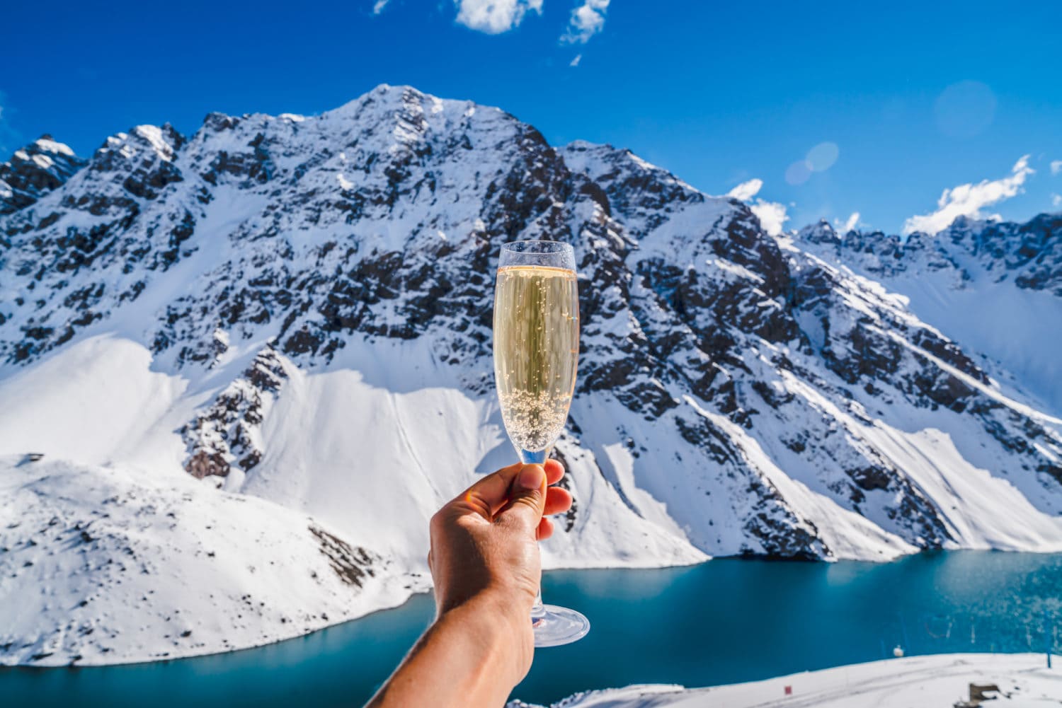 Champagne and snow - Snow Champagne Background Mountain. Snow Ski Luxury Resort & Blue Crystal Background. Winter Plateau, Austria. Snowboarding in Winter Holidays. Adventure. Snow Mountain Alps from Peak. Winter Ski.