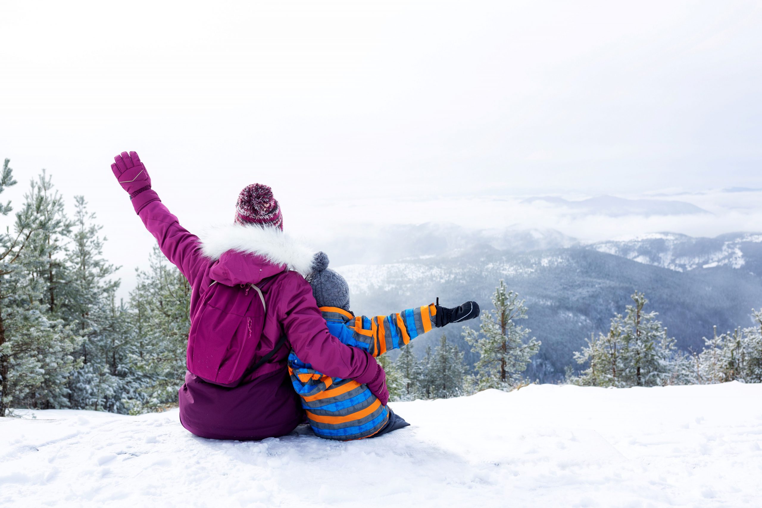 Families skiing at Easter in a high-altitude resort
